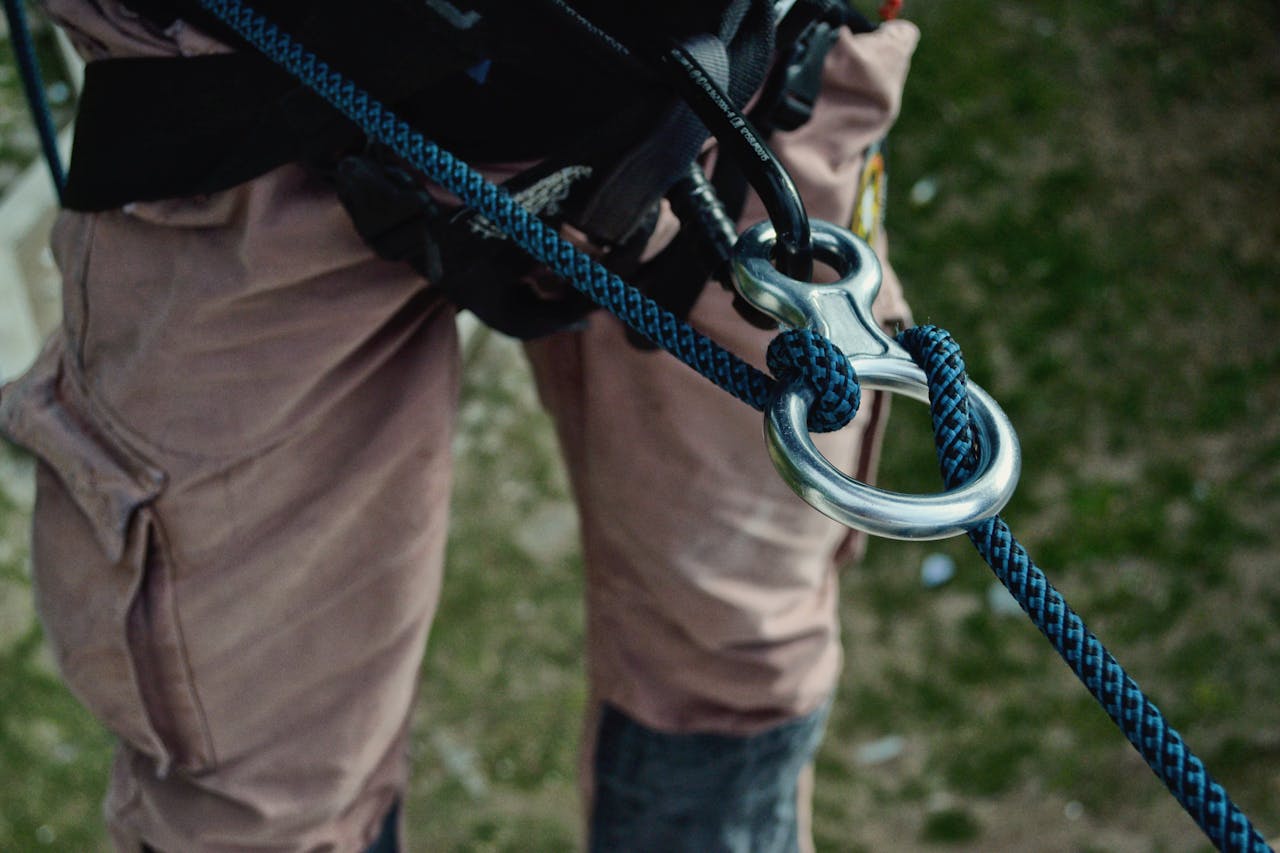 Crafting Captivating Headlines: Your awesome post title goes here Detailed view of climbing gear showing carabiners and ropes on an outdoor adventure.